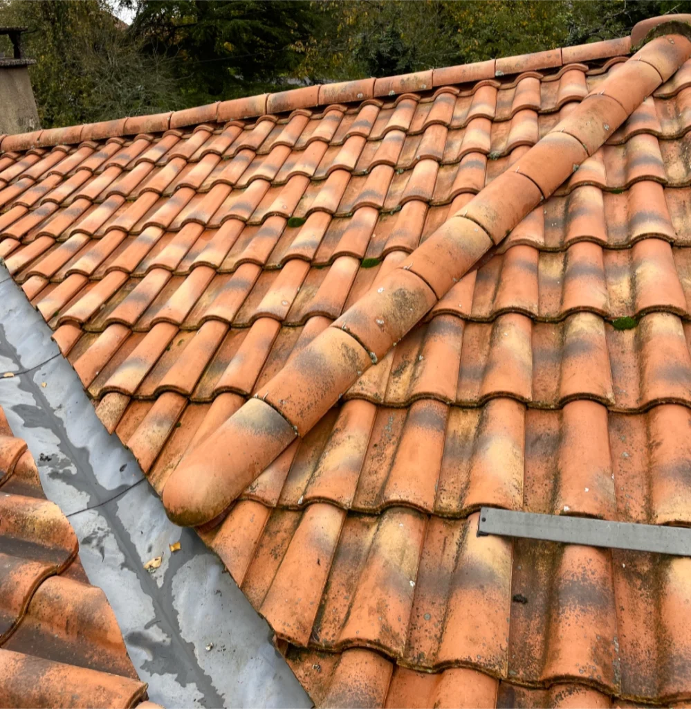 Coiffe en tuile sur évacuation zinc